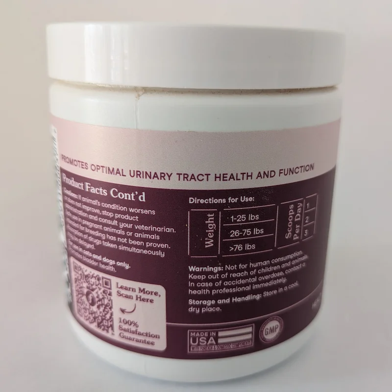 The back of the bladder support tub showing weight-based dosage and administration directions.