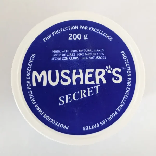 Top view of a 200g container of Musher's Secret paw protection wax.