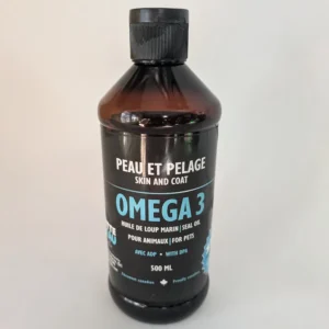 A dark amber bottle of Omega 3 Seal Oil for skin and coat health with a black and teal label.