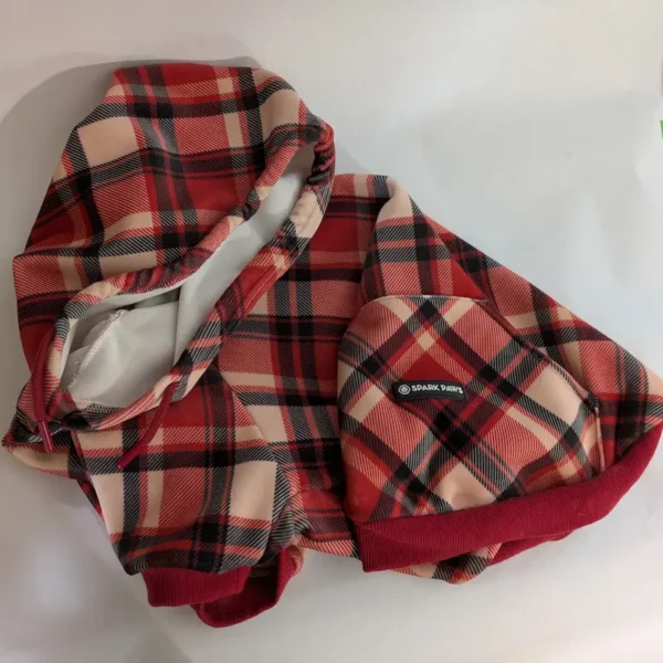 Red and black plaid Spark Paws dog hoodie with soft fleece lining.