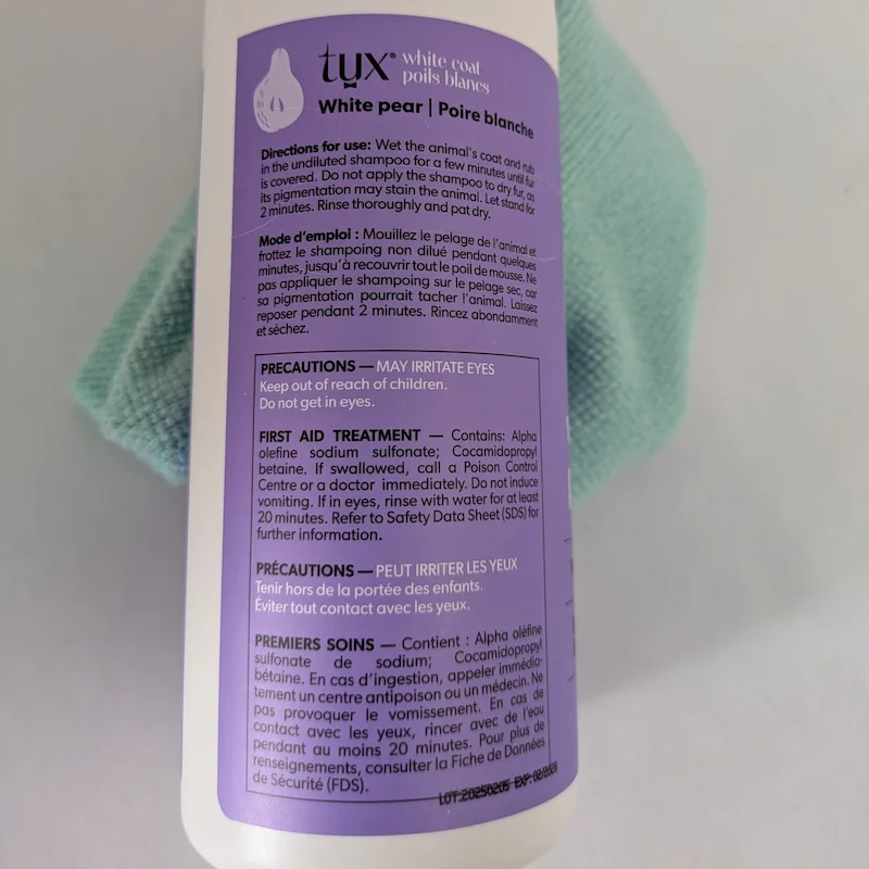 Mode d'emploi et précautions d'emploi du shampoing TUX pour blouses blanches.