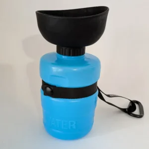 Bright blue portable dog water bottle with a black foldable silicone bowl on top.