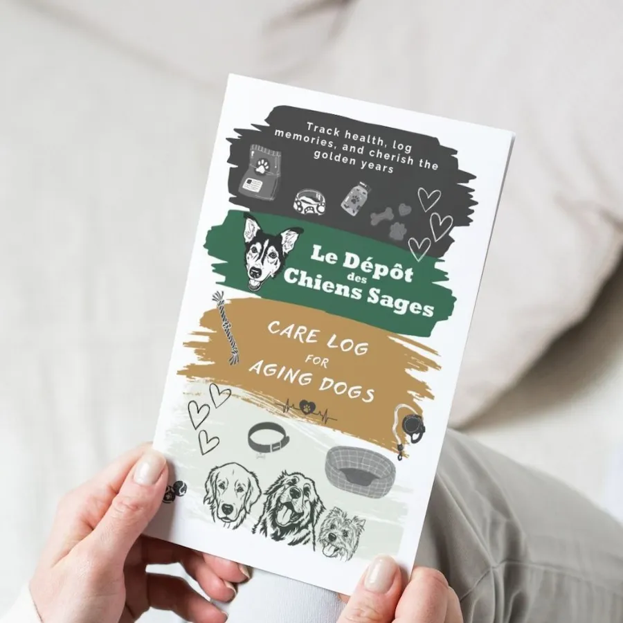 A person holding the physical 6x9 paperback pet health tracker book resting on their knee.